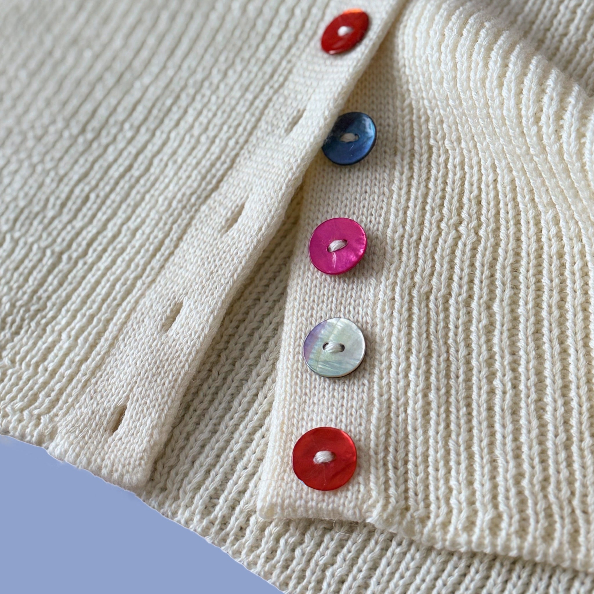 Versatile Ecru Turtleneck Sweater with Mother-of-Pearl Buttons